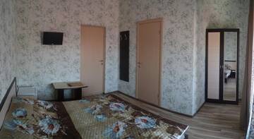 Фото номера Двухместный номер с 2 отдельными кроватями Гостиница «Юлия» г. Сукко 2