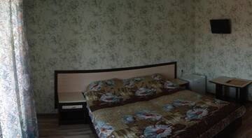 Фото номера Двухместный номер с 2 отдельными кроватями Гостиница «Юлия» г. Сукко 3