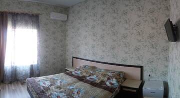 Фото номера Двухместный номер с 2 отдельными кроватями Гостиница «Юлия» г. Сукко 4