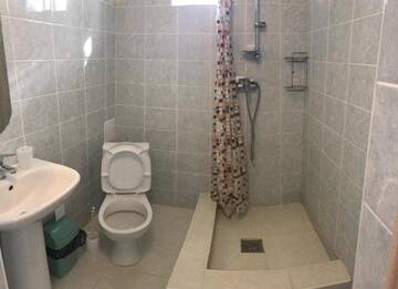 Фото номера Улучшенный семейный номер Гостевой дом Джулия г. Сукко 3